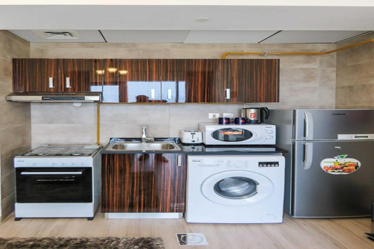 Oyo 860 Studio Apartment, Maya Tower 4, Jumeirah Village Triangle 迪拜 外观 照片