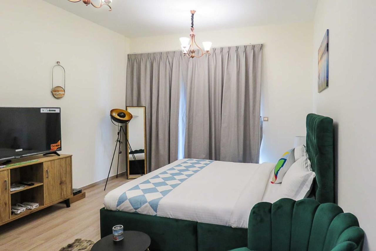 Oyo 860 Studio Apartment, Maya Tower 4, Jumeirah Village Triangle 迪拜 外观 照片