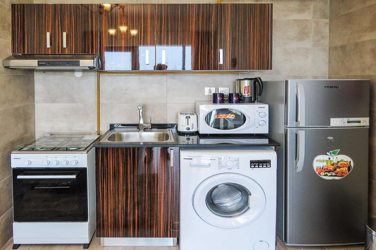 Oyo 860 Studio Apartment, Maya Tower 4, Jumeirah Village Triangle 迪拜 外观 照片