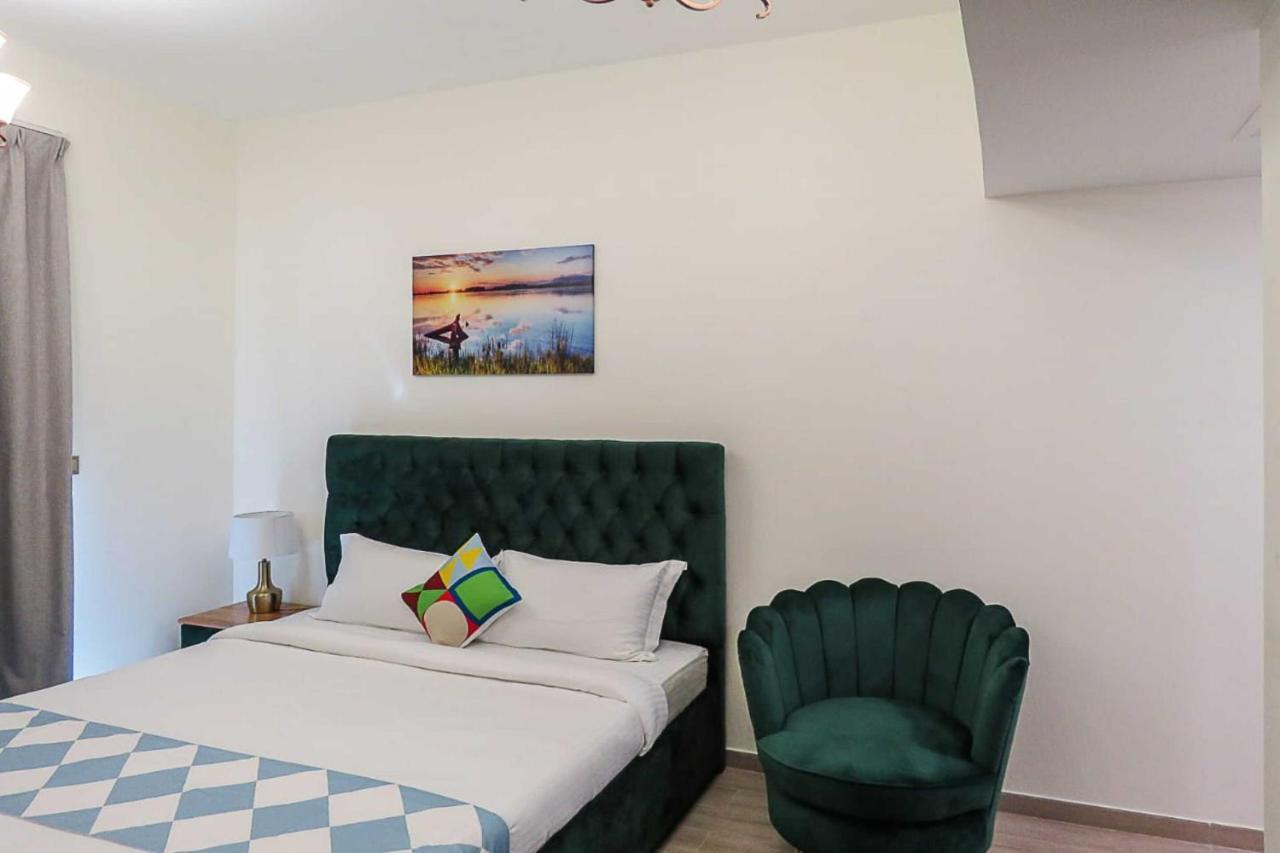 Oyo 860 Studio Apartment, Maya Tower 4, Jumeirah Village Triangle 迪拜 外观 照片