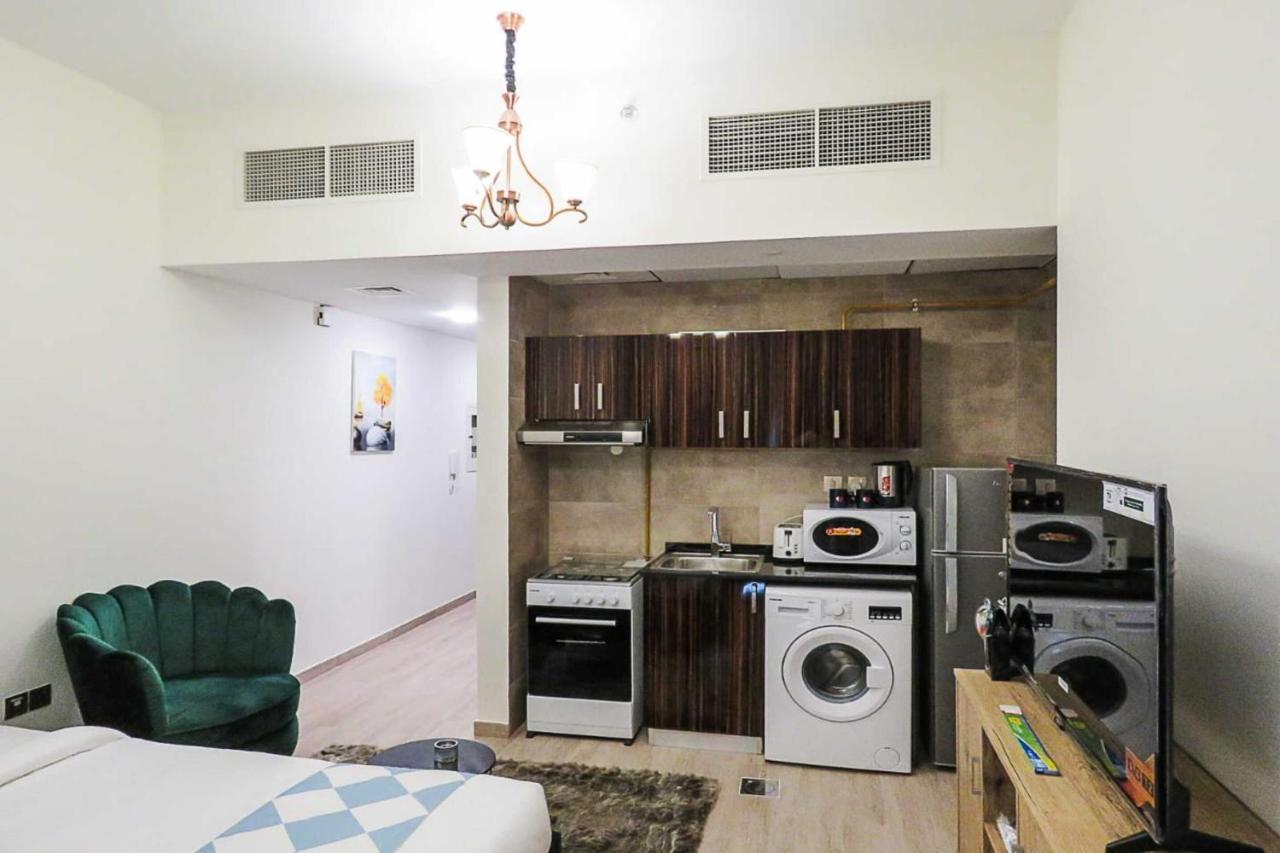 Oyo 860 Studio Apartment, Maya Tower 4, Jumeirah Village Triangle 迪拜 外观 照片